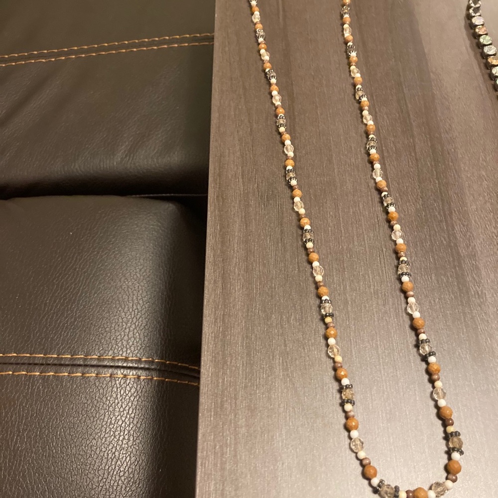 Long brown-beaded necklace